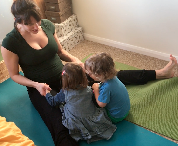 Kat Frost of Yoga2shape sings the Row Row the Boat song with actions in a Yoga2shape children's Yoga class (YogaShapes).